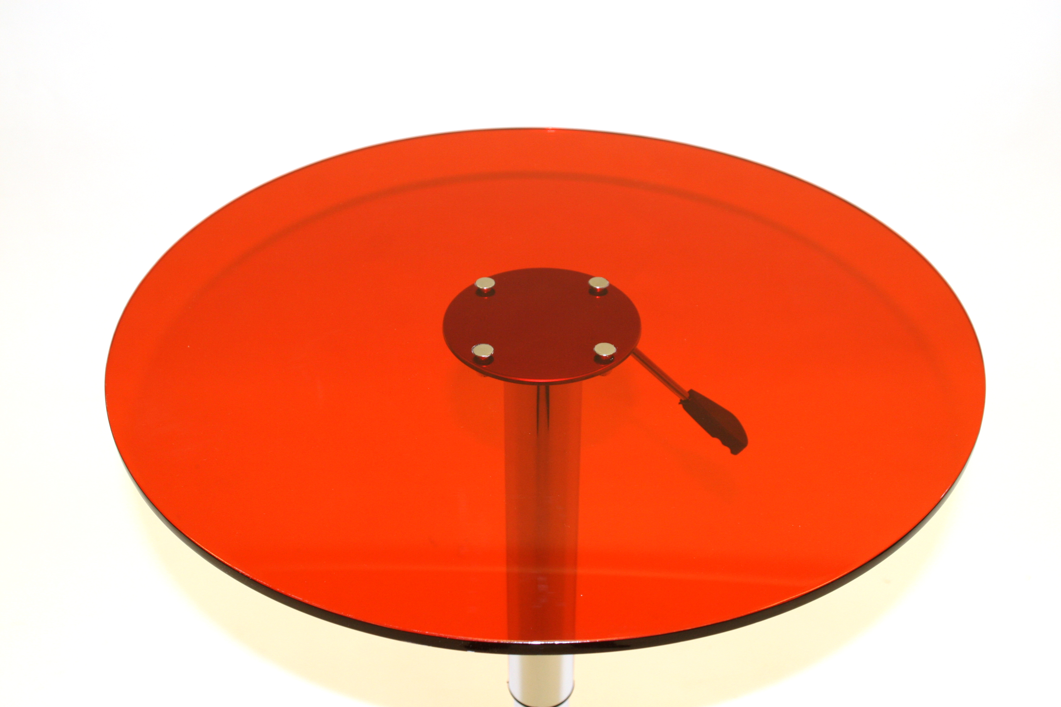 Red Acrylic Bistro Table - 60cm diameter red acrylic swivel gas lift table with a chrome metal base - BE Event Hire