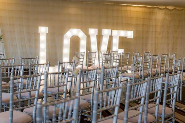 Silver Chairs 1 Silver Chiavari Chairs layed out for wedding ceremony - BE Event Hire