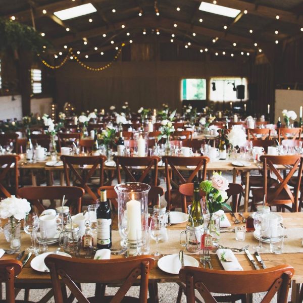 Traditional wooden crossed back chairs being used for a wedding - BE Event Hire