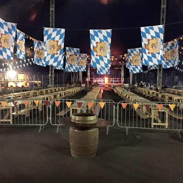 benches and trestle tables at use at an Ocktoberfest beer festival - BE Event Hire